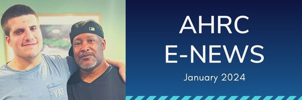 Banner with the words AHRC e-News January 2024 and image of two men smiling toward the camera.