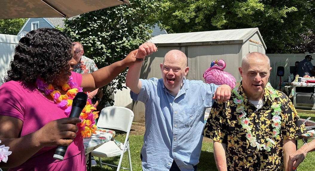 AHRC residents and staff enjoying summer gathering